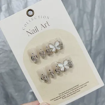 Прес-пеперуда Ice Diamond на ноктите си къси остри форми на ръчно изработени с помощта на луксозен и изискан гел В магазина Emmabeauty.№19321